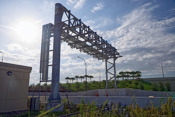 Construction on I-4 Ultimate continues. Toll gantries have started to appear over express lanes.